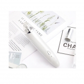 Vakuový čistič pleti na černé tečky